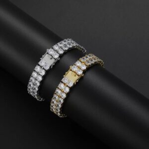 Bracelets Double Ice Line argenté et doré à deux rangées de pierres rondes sur un support noir